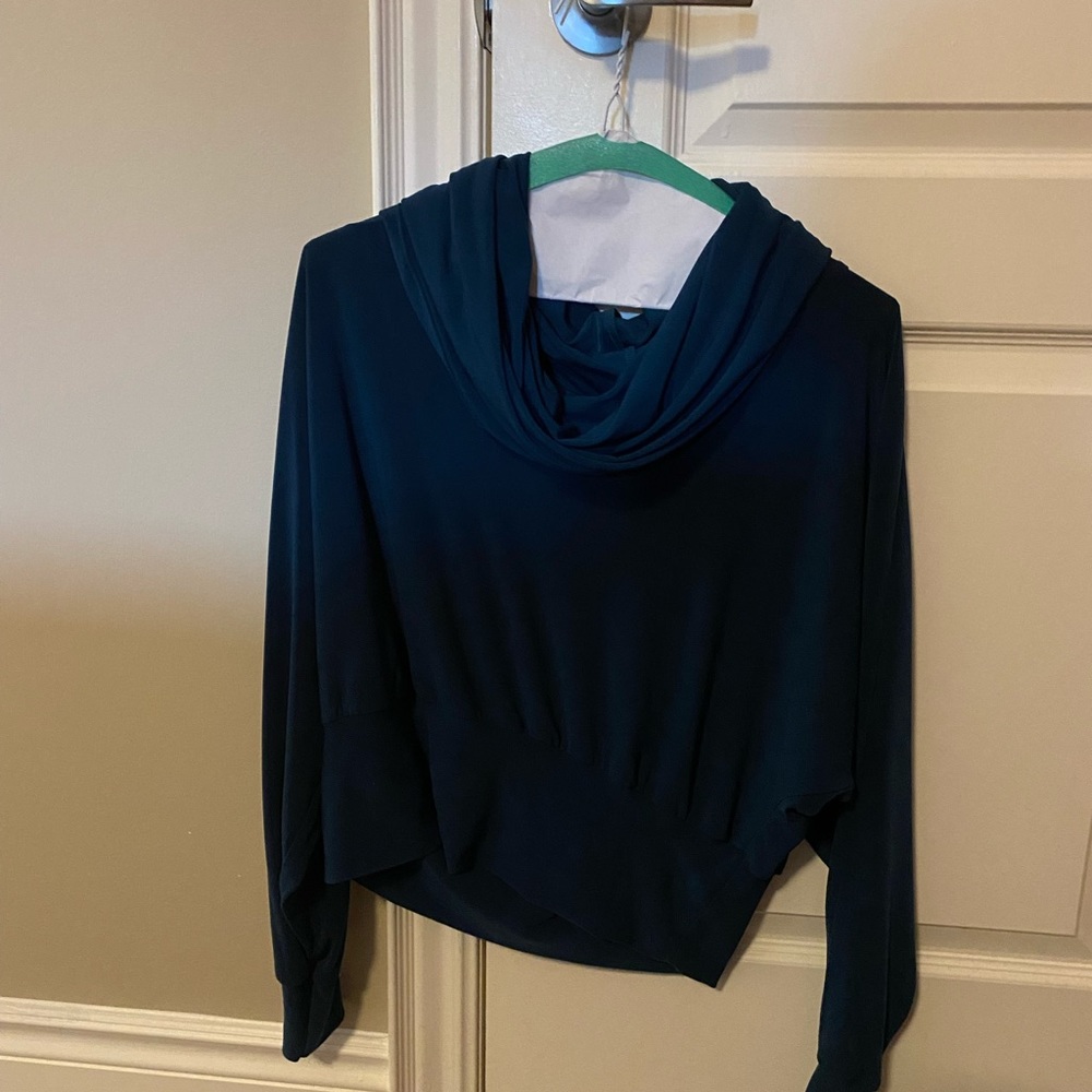 Dual purpose. Either mini dress or top with folded neck line